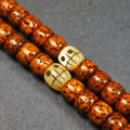 1 Pair of Fish Bone Skull Beads 0.3" - Tibetan Buddhist art, front view