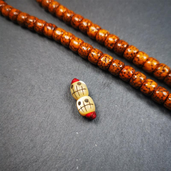 1 Pair of Fish Bone Skull Beads 0.3" - Tibetan Buddhist art, detailed view