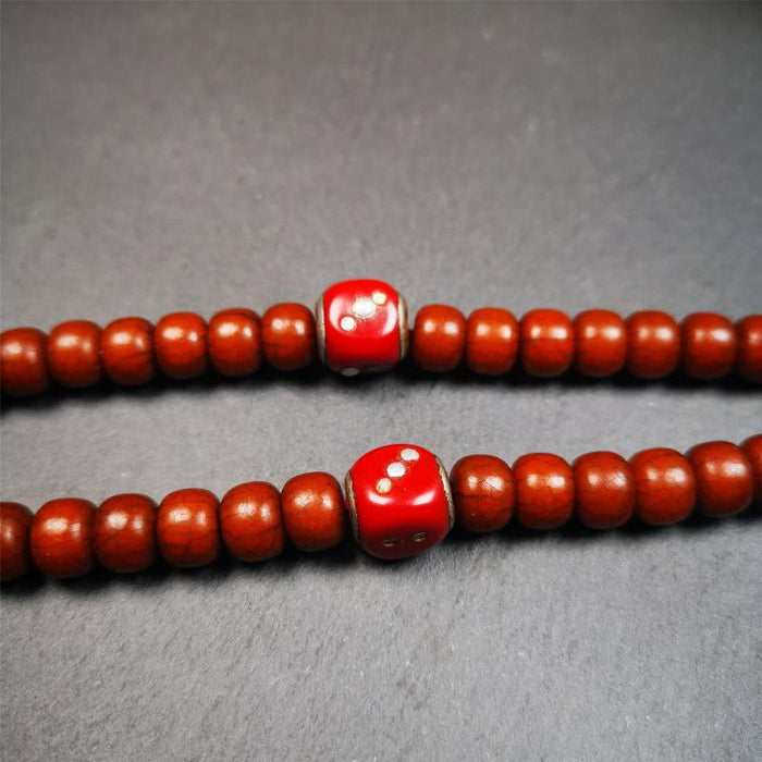 1 Pair of Plastic Dice Beads 0.47" - Tibetan Buddhist art, close-up detail