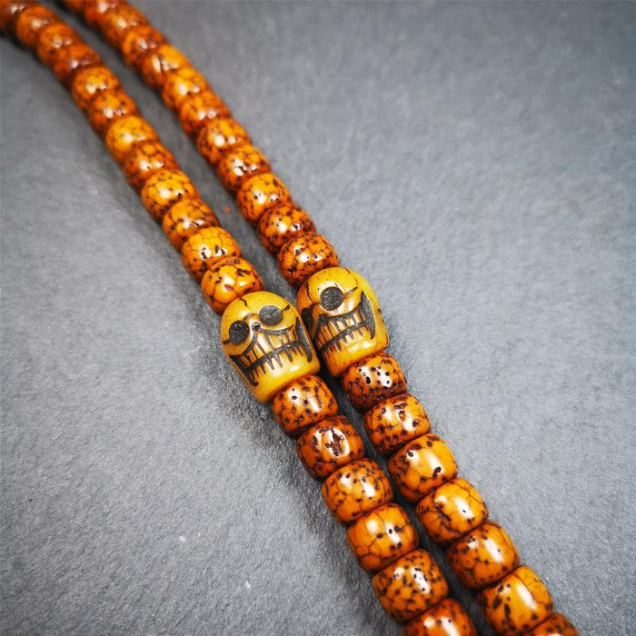 1 Pair of Yak Bone Skull Beads 0.4" - Tibetan Buddhist art, front view