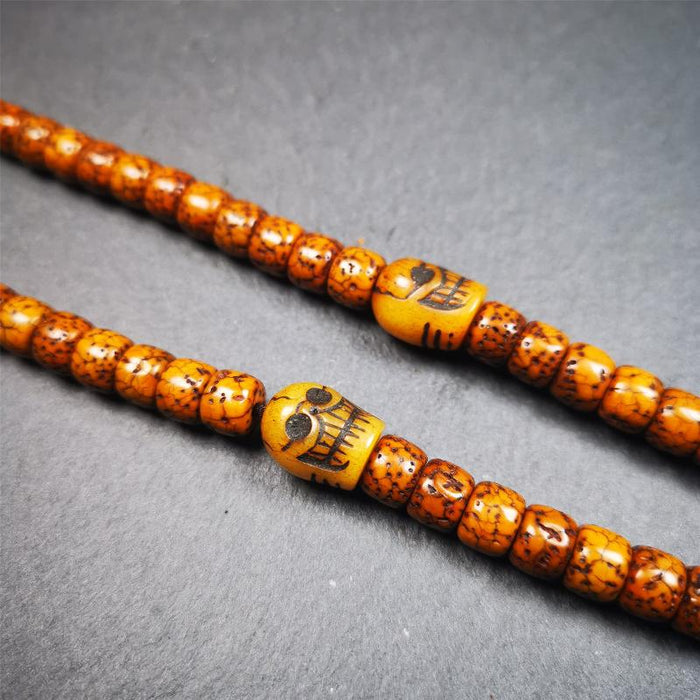 1 Pair of Yak Bone Skull Beads 0.4" - Tibetan Buddhist art, close-up detail