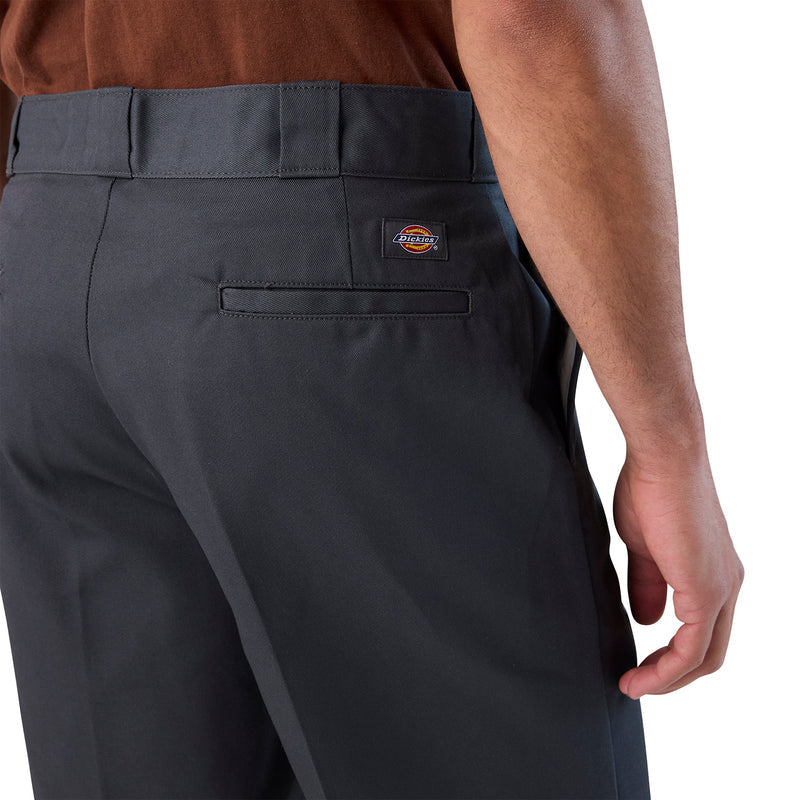 Men's charcoal 11-inch shorts close-up: side pocket and logo patch at waist