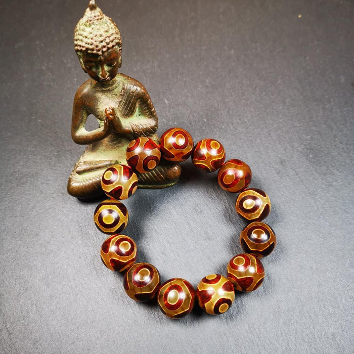3 Eyes Dzi Bead Bracelet 0.63" - Tibetan dzi bead, front view