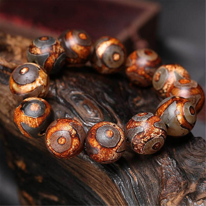 3 Eyes Dzi Bead Bracelet - Tibetan Buddhist mala beads, front view