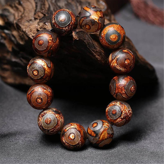 3 Eyes Dzi Bead Bracelet - Tibetan Buddhist mala beads, detailed view