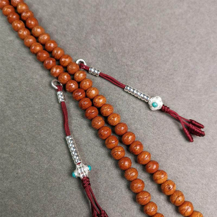 4mm Silver Prayer Bead Counters - Tibetan Buddhist art, detailed view