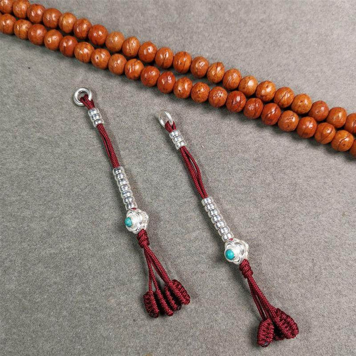 4mm Silver Prayer Bead Counters - Tibetan Buddhist art, close-up detail