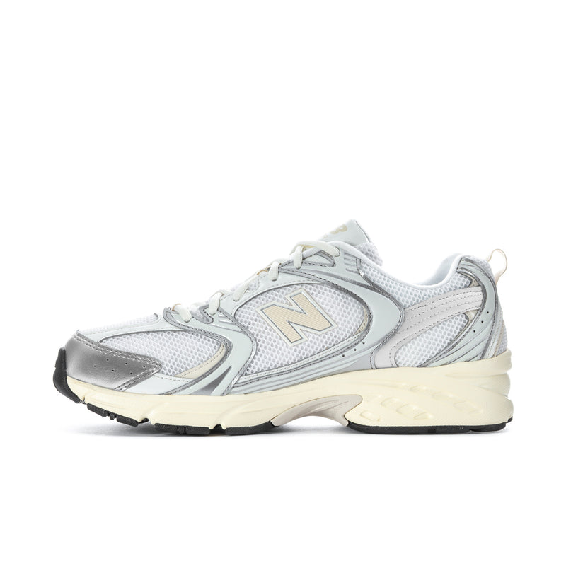 Men's athletic sneakers, side view: silver mesh panels with N logo and cream midsole