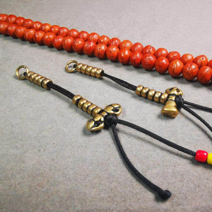 5mm Brass Prayer Bead Counters with Dorje Bell Pendant - Tibetan Buddhist art, close-up detail