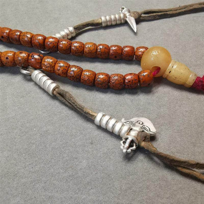 5mm Sterling Silver Prayer Bead Counters - Tibetan Buddhist art, close-up detail
