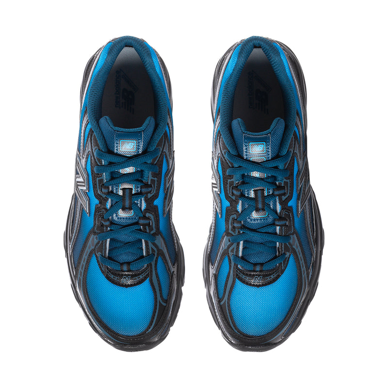 Pair of men's New Balance sneakers viewed from the top, blue mesh with lace-up closure.