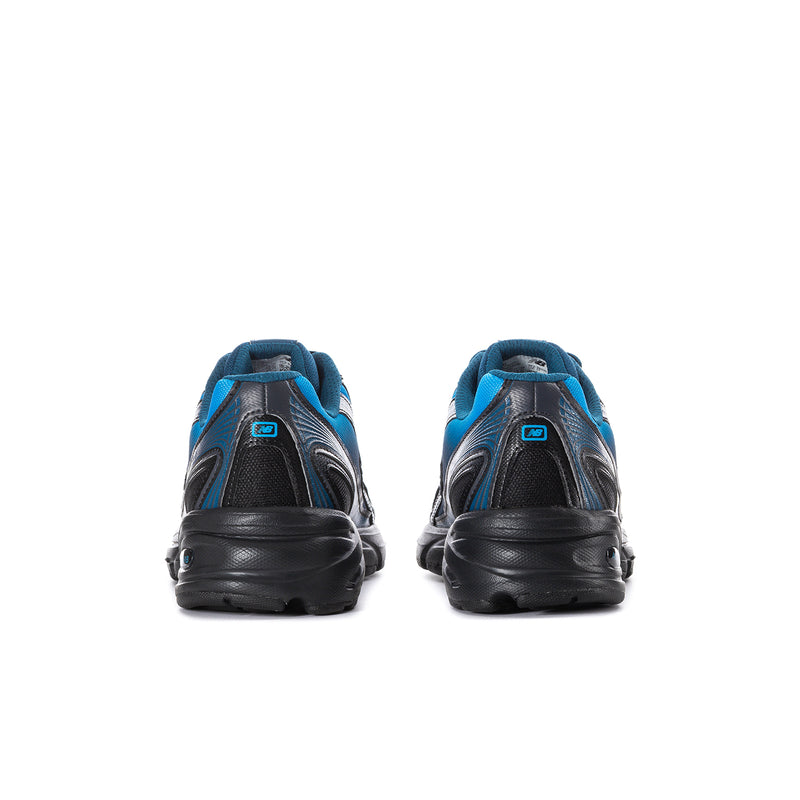 Men's New Balance sneakers from heel view, blue uppers with black heel and sole.