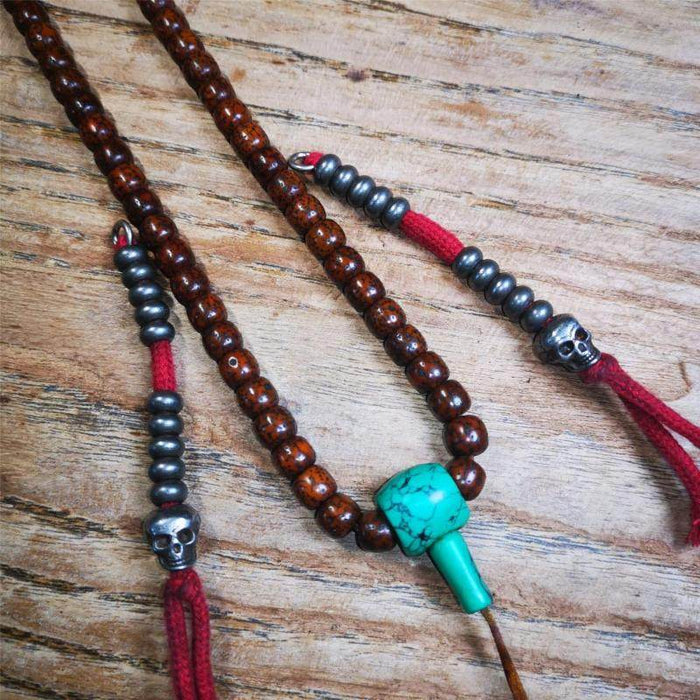 7mm Cold Iron Prayer Bead Counters with Skull Pendant - Tibetan Buddhist art, detailed view