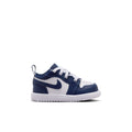 Toddler navy and white low-top sneakers with lace-up front and Nike Swoosh