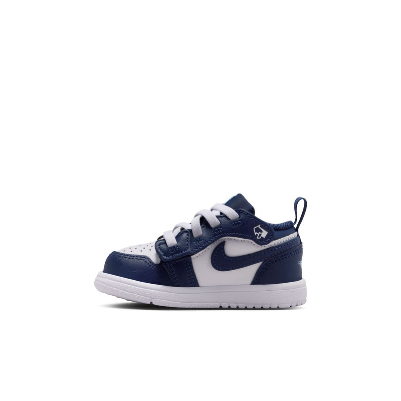 Toddler navy and white low-top sneakers with lace-up, Nike Swoosh, and white midsole