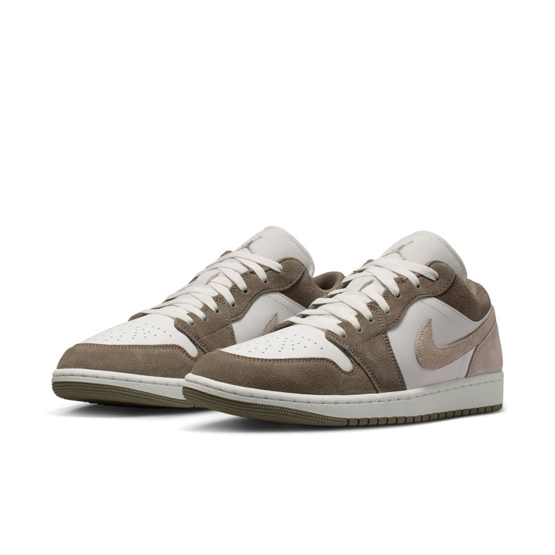 Men's low-top sneakers pair in brown suede and white leather with lace-up design