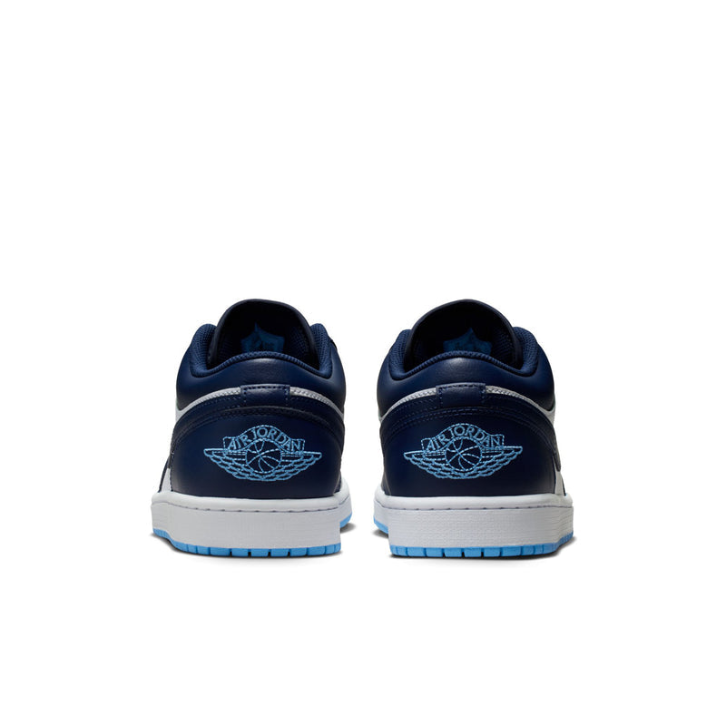 Men's low-top sneakers heel view, navy backs with blue Air Jordan wing logo.