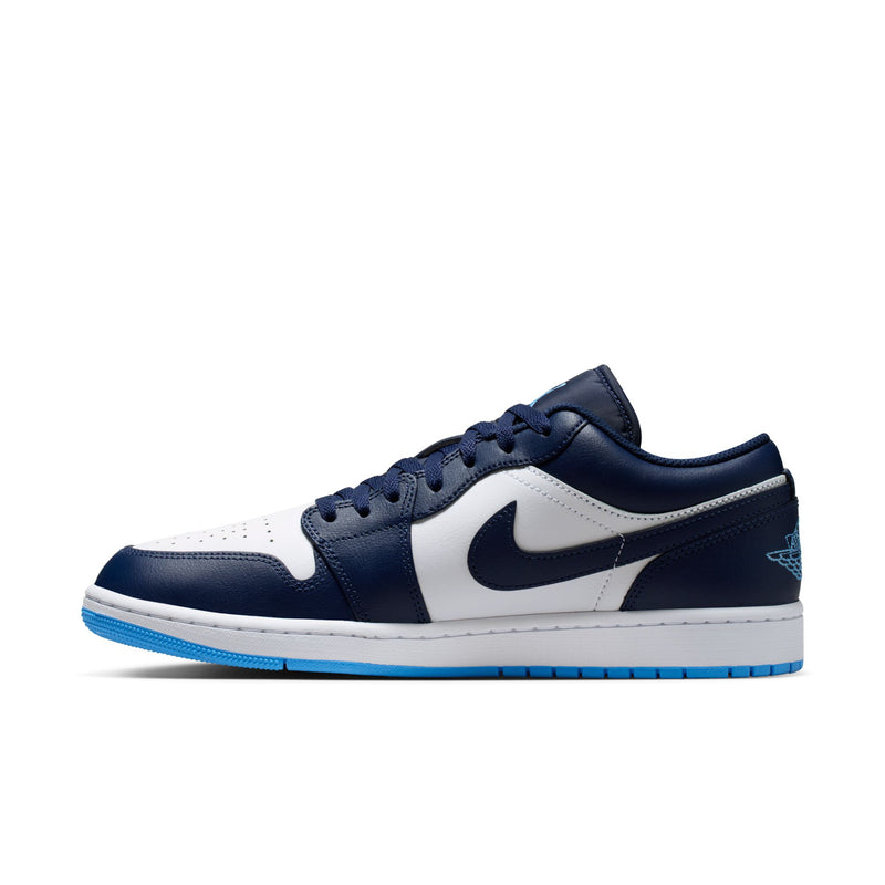 Men's low-top sneakers profile view, white overlays with navy leather and blue accents.
