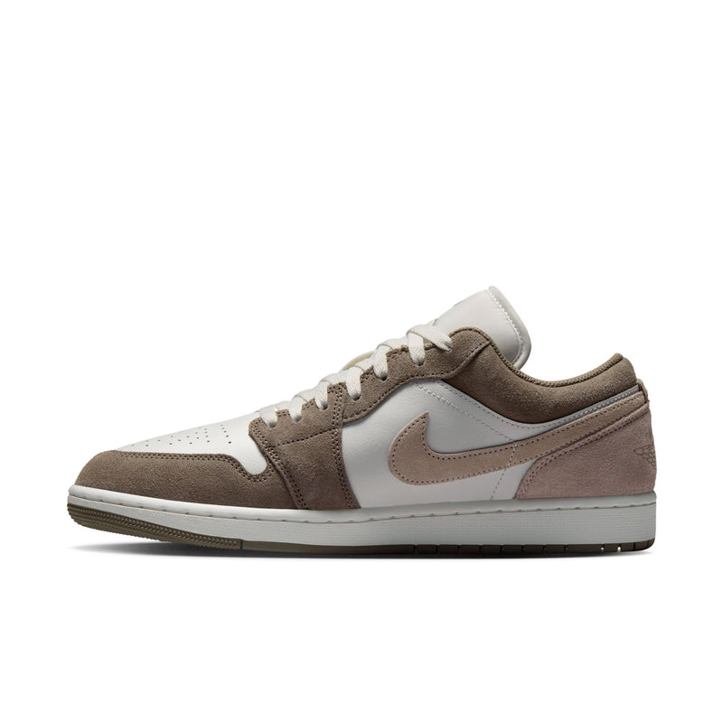 Men's low-top sneakers in brown and white with lace-up front and side swoosh