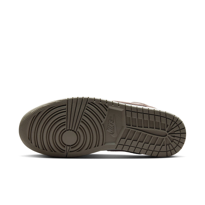 Men's low-top sneaker outsole in brown with textured tread pattern