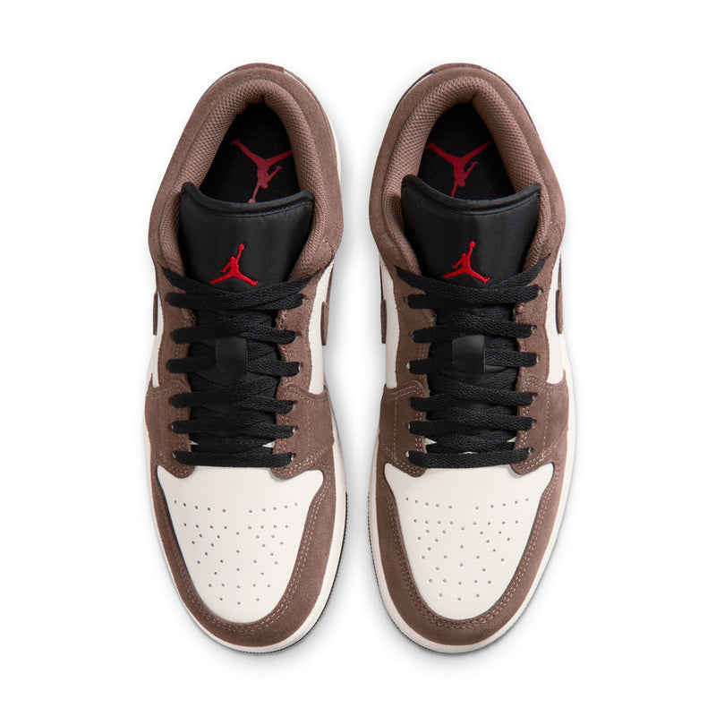 Pair of men’s low-top sneakers showing black laces, brown suede, and red Jordan logo