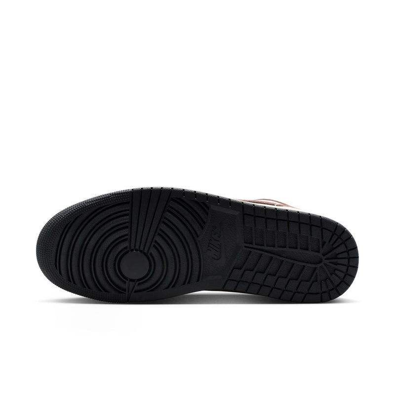 Men’s low-top sneaker outsole, black rubber tread with brown detail near edge
