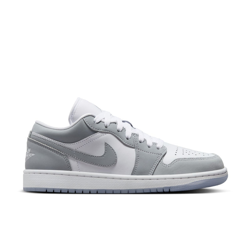 Women's Air Jordan 1 low-top sneakers in white and gray, lace-up design