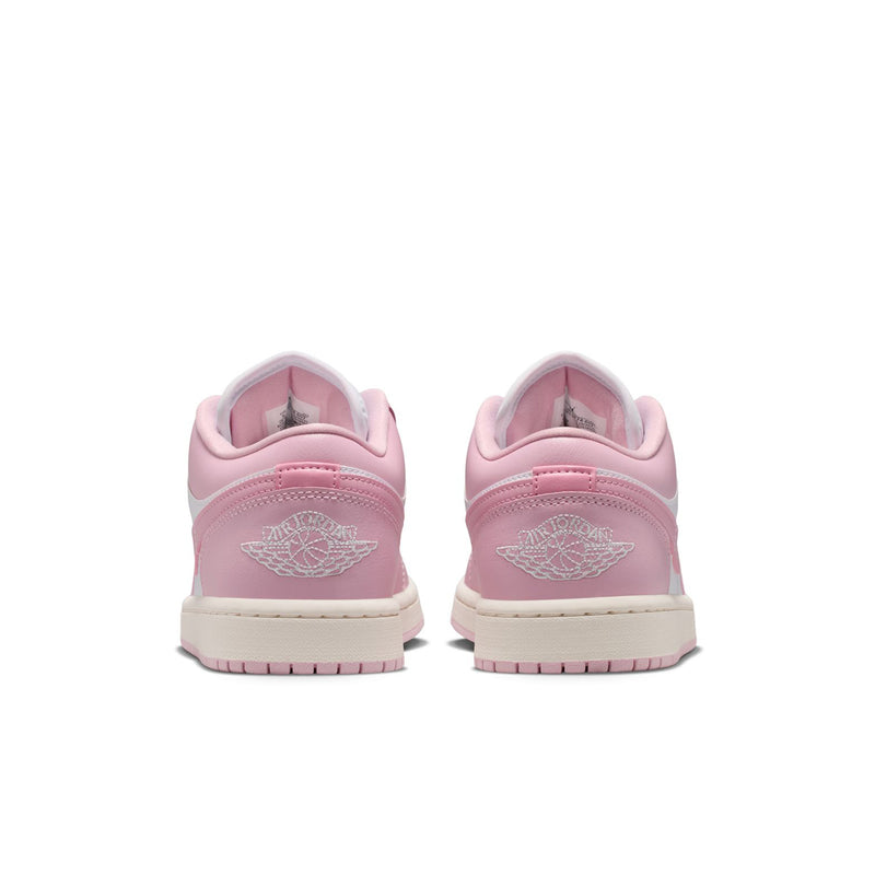 Women's sneakers with pink heel panels, rear branding, and rubber outsole tread