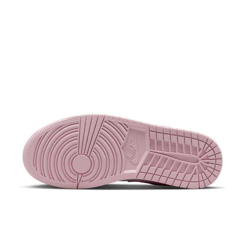 Women's sneaker outsole in light pink with circular traction pattern