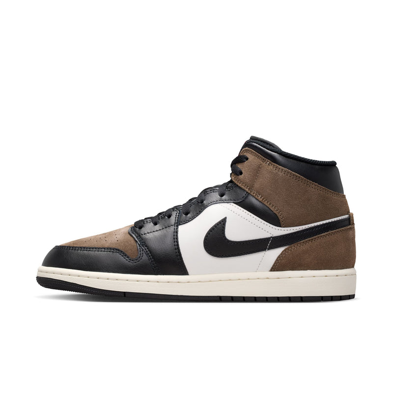 Side view of mens mid-top sneakers with white Swoosh, black overlays, and tan ankle panel