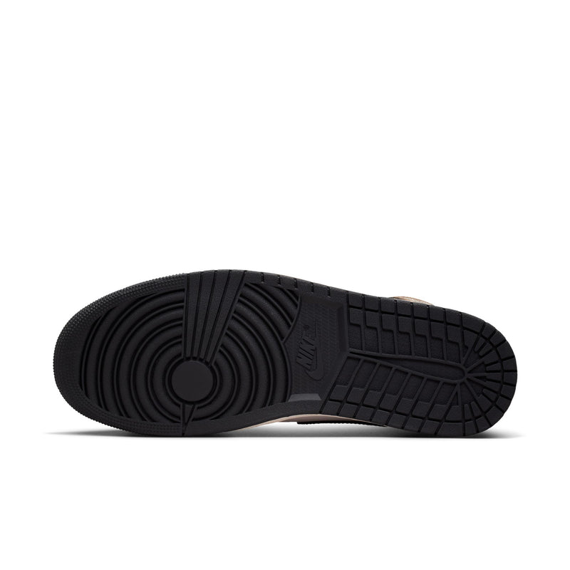 Outsole view of mens mid-top sneakers in black with patterned traction tread