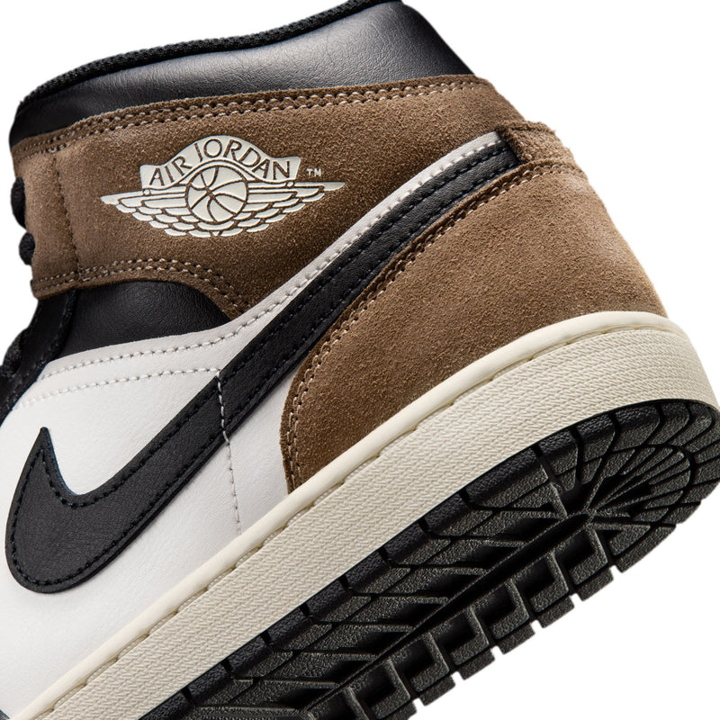 Detail view of mens sneaker heel with Air Jordan Wings logo and tan suede trim