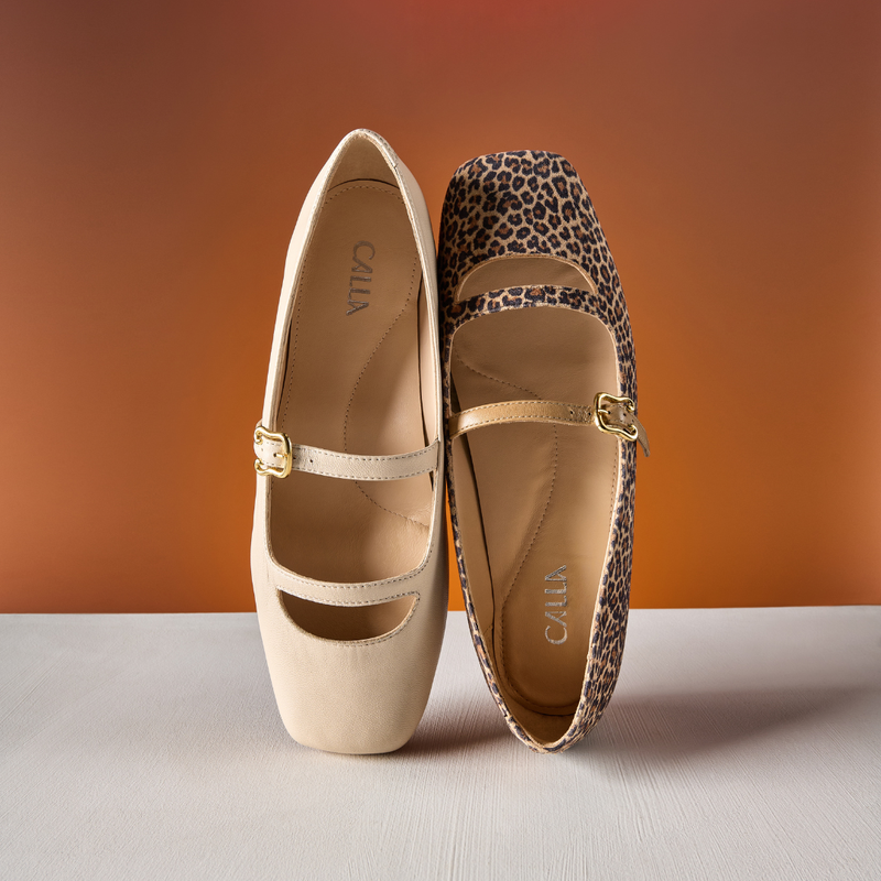 Pair of beige and leopard print shoes on a gradient background