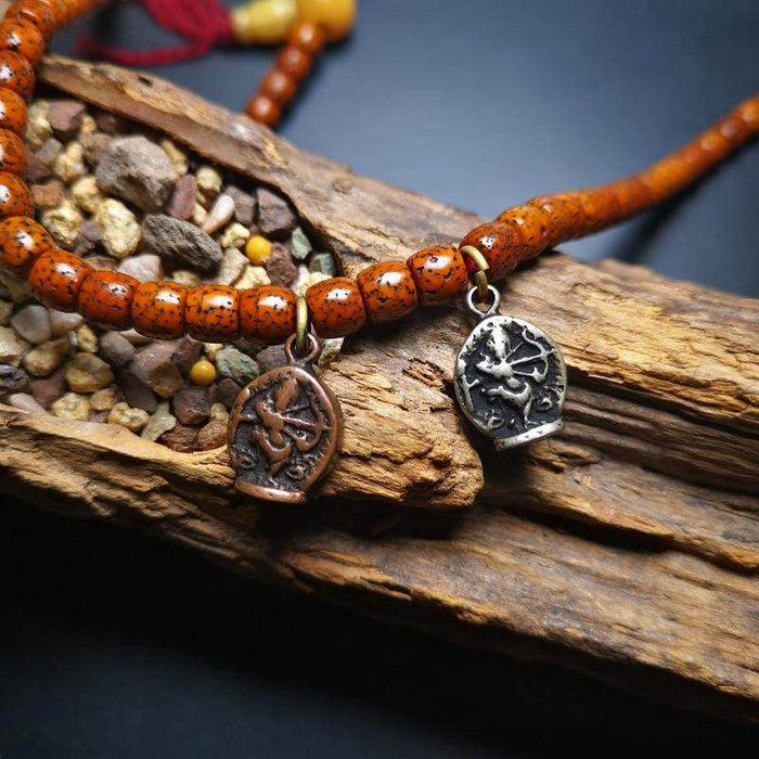 Amulet,Kurukulla Pendant - Tibetan Buddhist amulet, front view