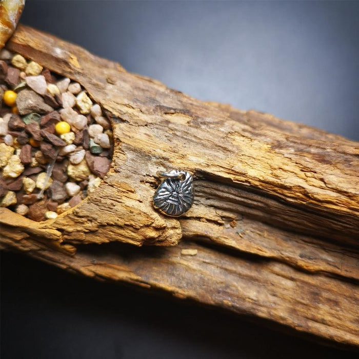 Amulet,Wheel Pendant for Prayer Bead 0.43" - Tibetan Buddhist amulet, close-up detail