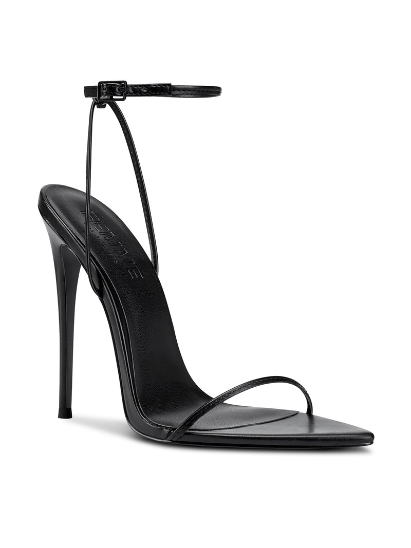 FEMME LA ANDX Sandal in black, 3/4 front angle showing thin ankle strap, toe strap, and FEMME-embossed black insole