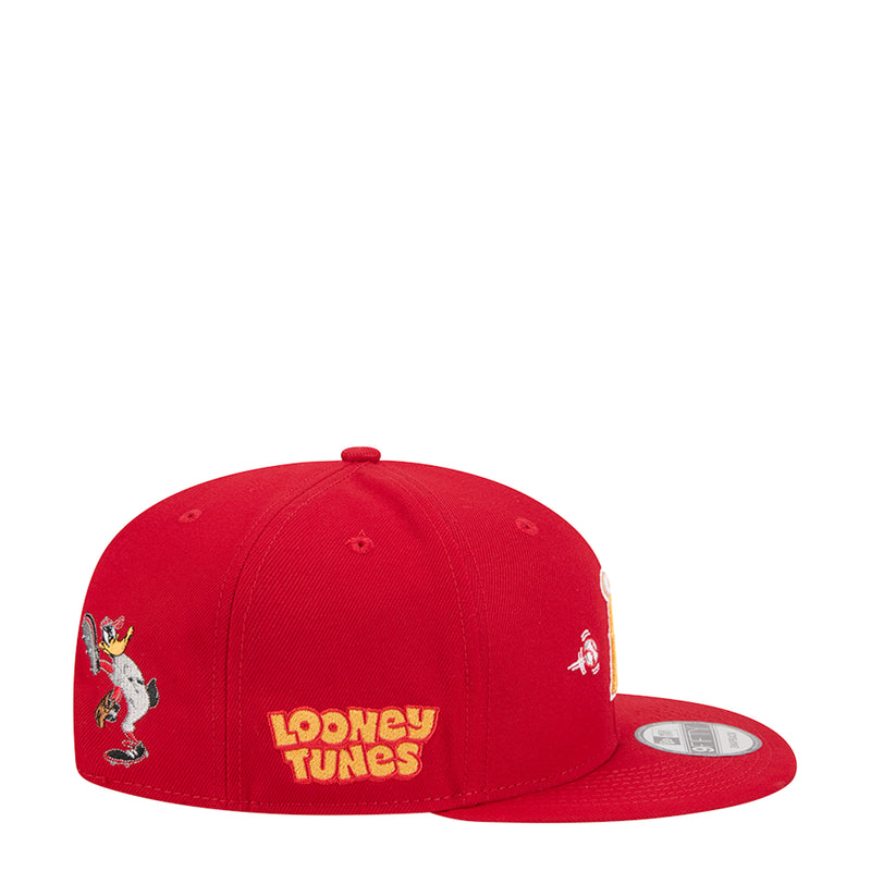 Red snapback baseball cap with 'Looney Tunes' logo on back and character side patches