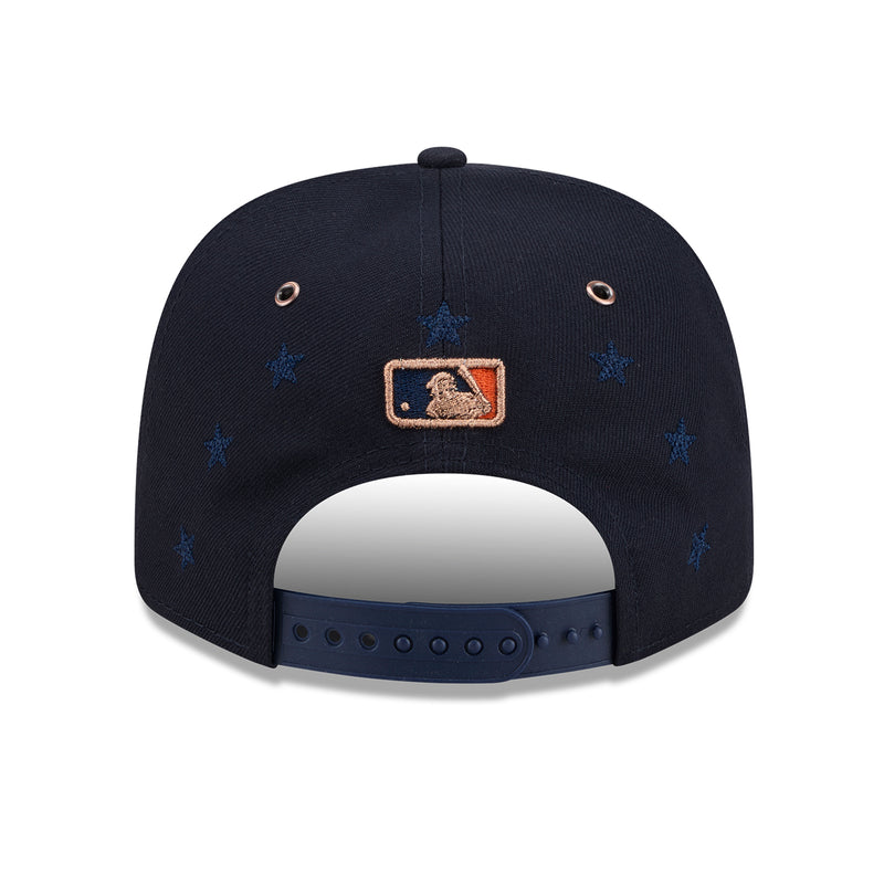 Navy baseball cap back with rectangular logo patch and small blue star pattern