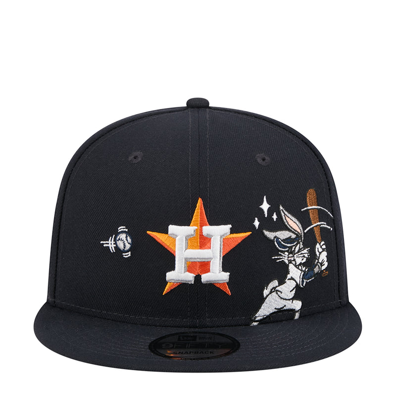 Navy snapback cap with H logo and Bugs Bunny graphic, orange accents