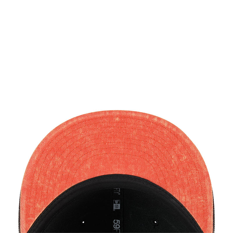 Orange heather cap crown with black underbill and interior size label