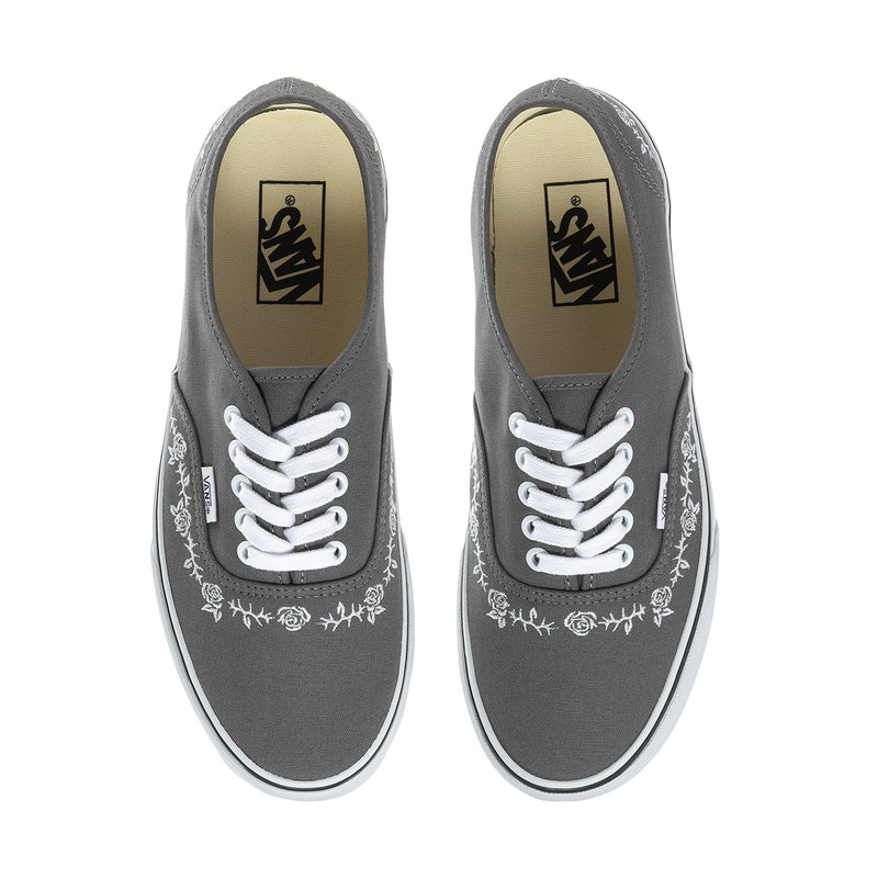 Front view of men's dark gray canvas sneakers with white laces and Vans logo