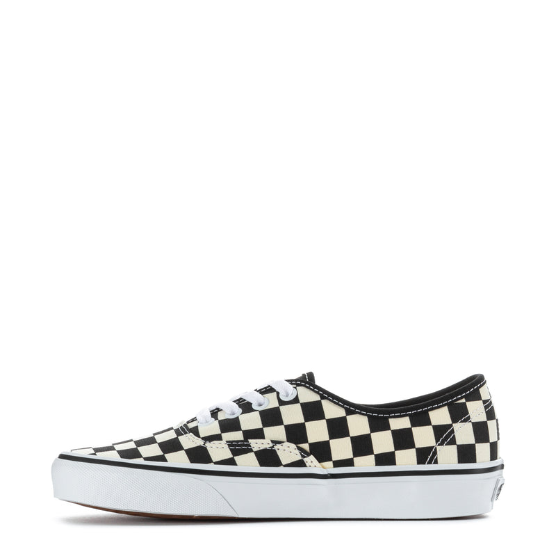 Youth checkerboard canvas lace-up sneakers in black and white, side profile view