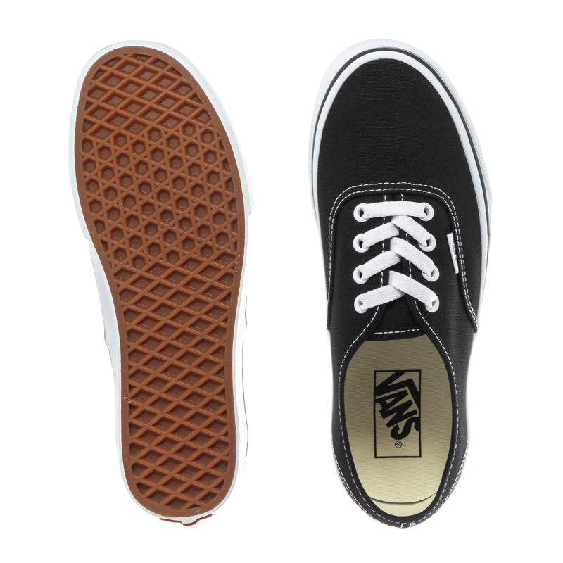 Youth sneaker outsoles: brown traction tread and black toe side