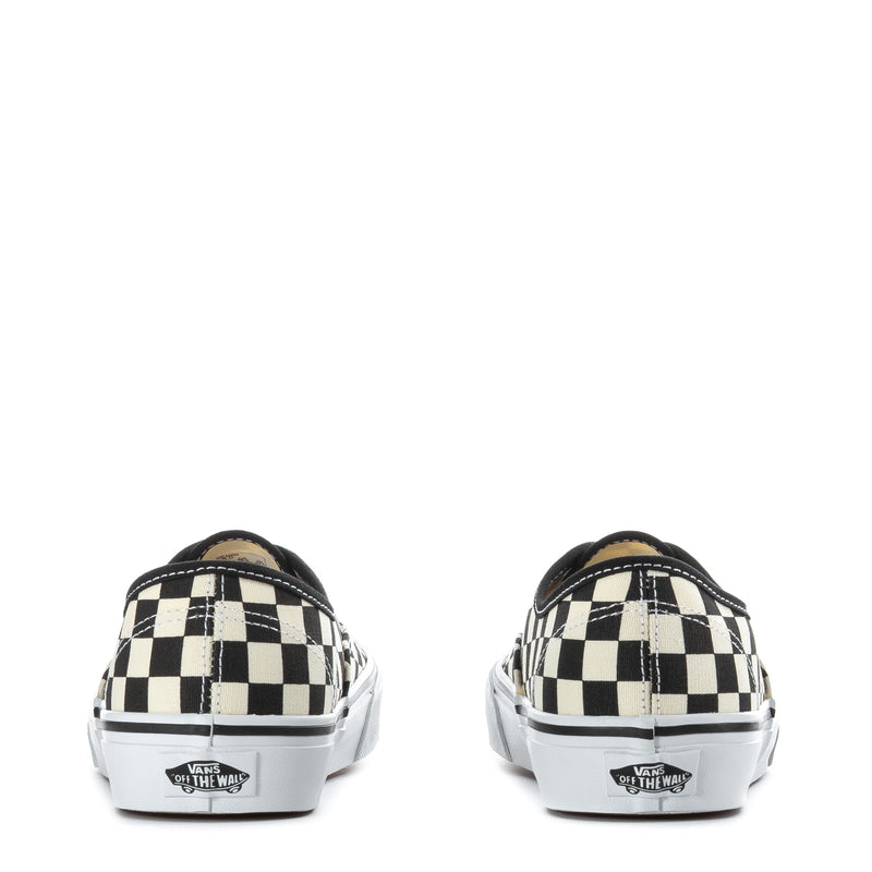 Youth checkerboard canvas sneakers from heel, black and white with Vans branding