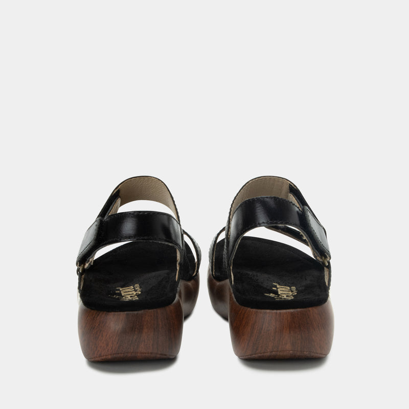 Bailee Woven Noir ankle strap adjustable sandal with non-flexing sleek rocker bottom with built in arch support.