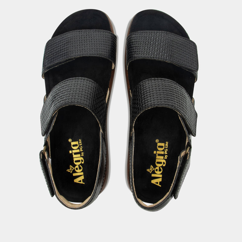 Bailee Woven Noir ankle strap adjustable sandal with non-flexing sleek rocker bottom with built in arch support.