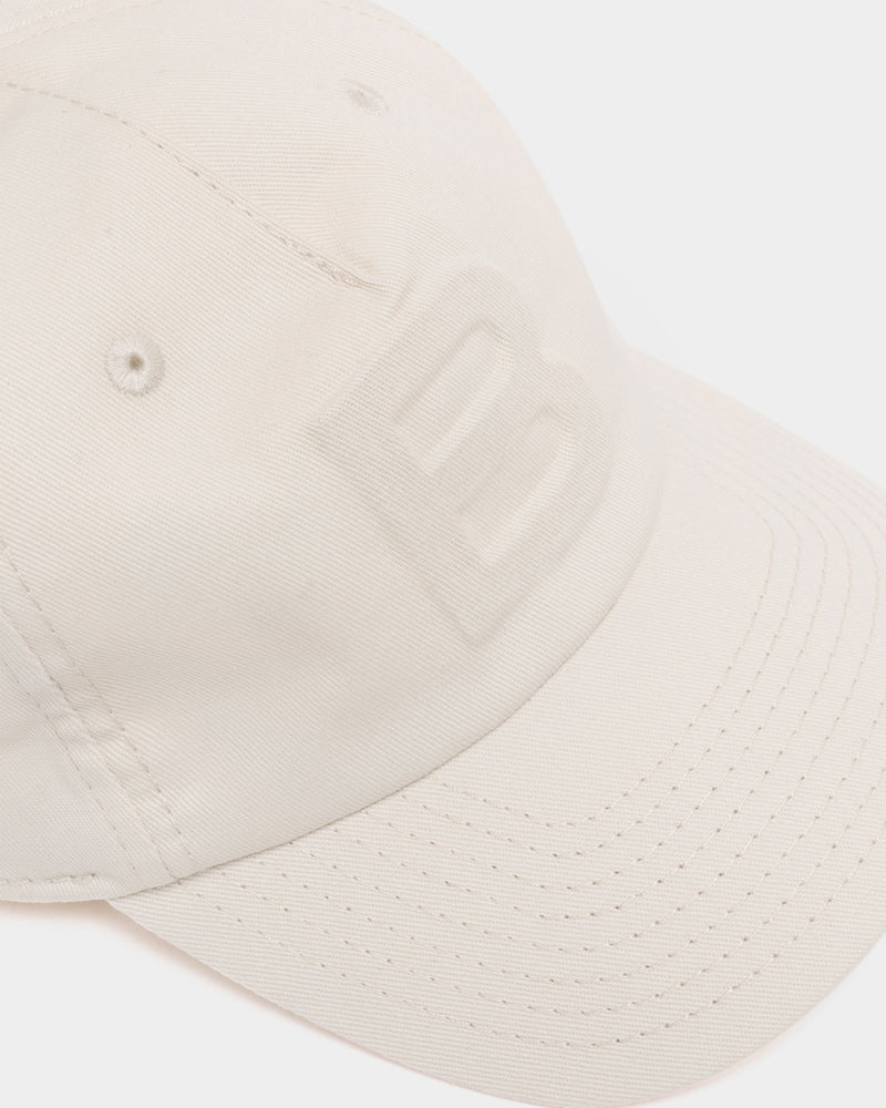 Baseball Hat in Ivory Cotton With a Debossed Logo