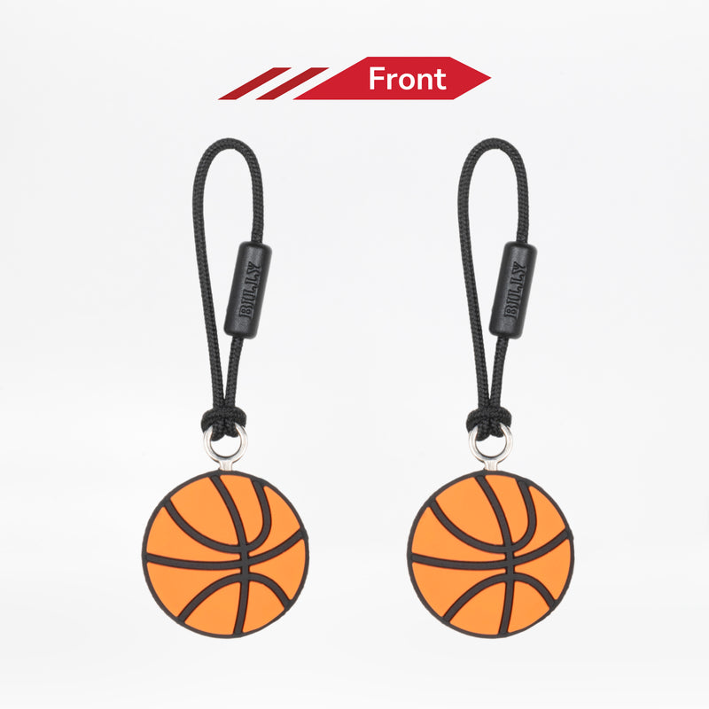 Two basketball-shaped zipper pulls with black strings on a white background