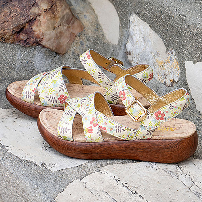 Bianca Good As Gold sandal| Tan floral printed leather sandal on a non-flexing rocker outsole.