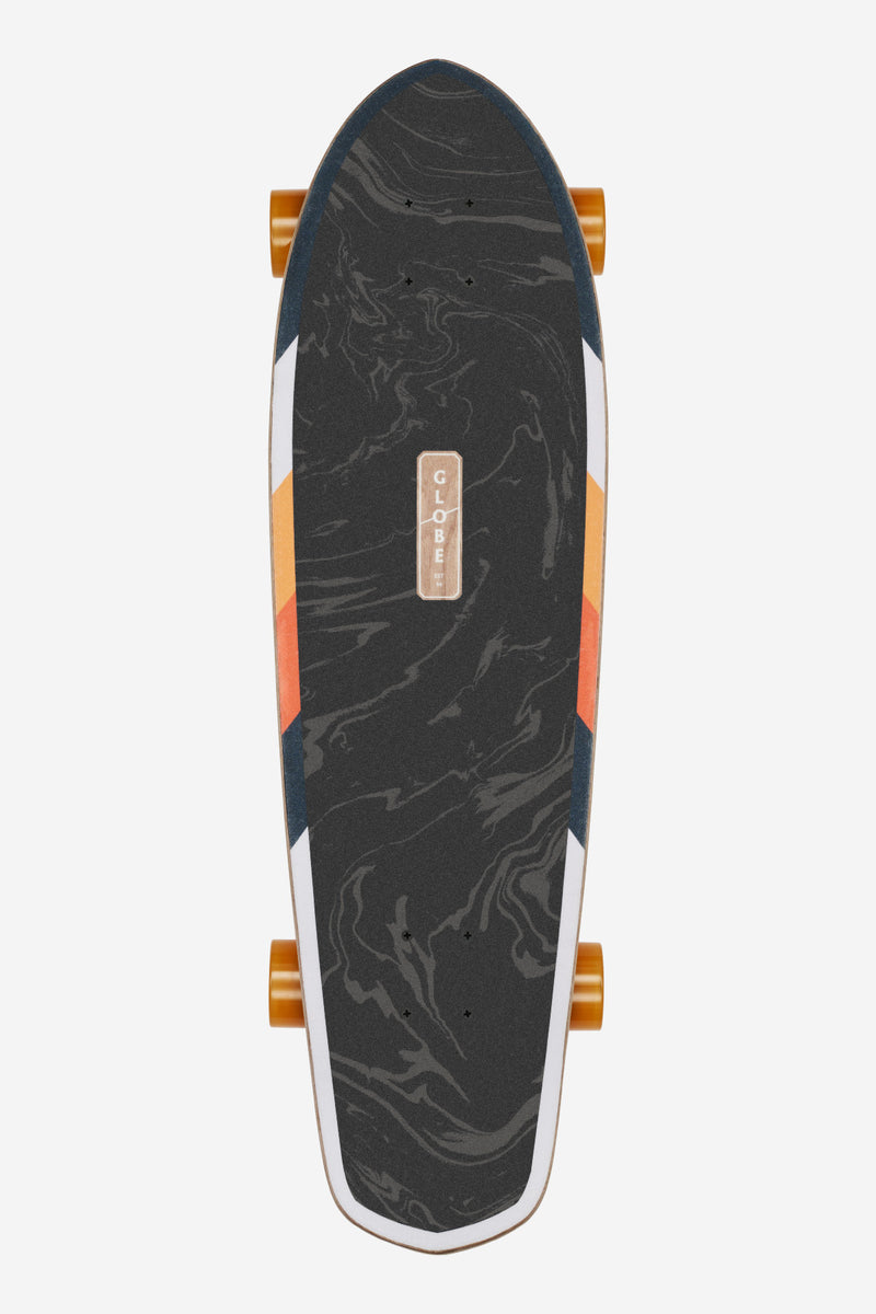 Top-down view of the Tune In cruiser deck showing dark marbled finish and orange wheels